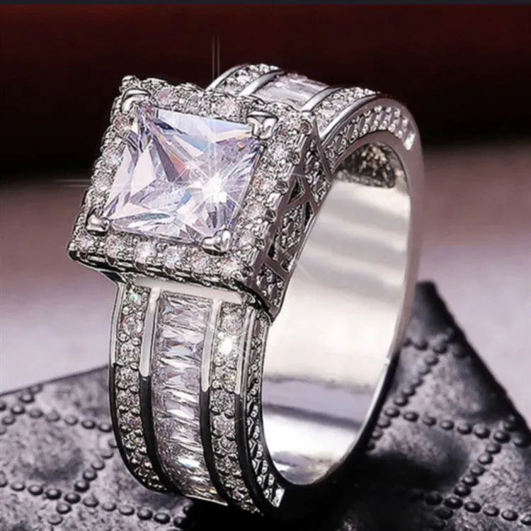 Geometric electroplated fashion ring in gold or white finish, women's sizes 5-13