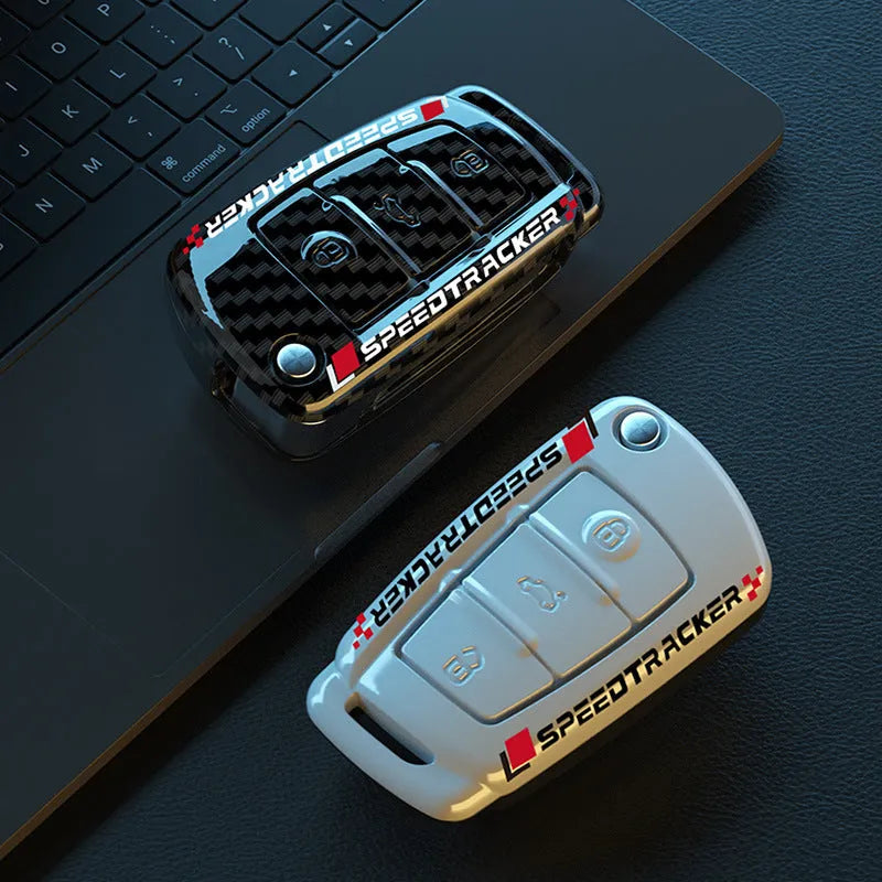 Carbon fibre style car key cover in carbon and white colours with mirror element