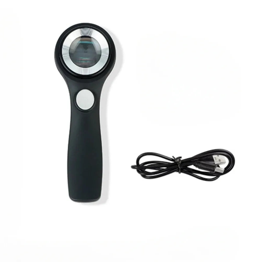 Black handheld magnifying glass with USB-C cable for charging its built-in inspection light.