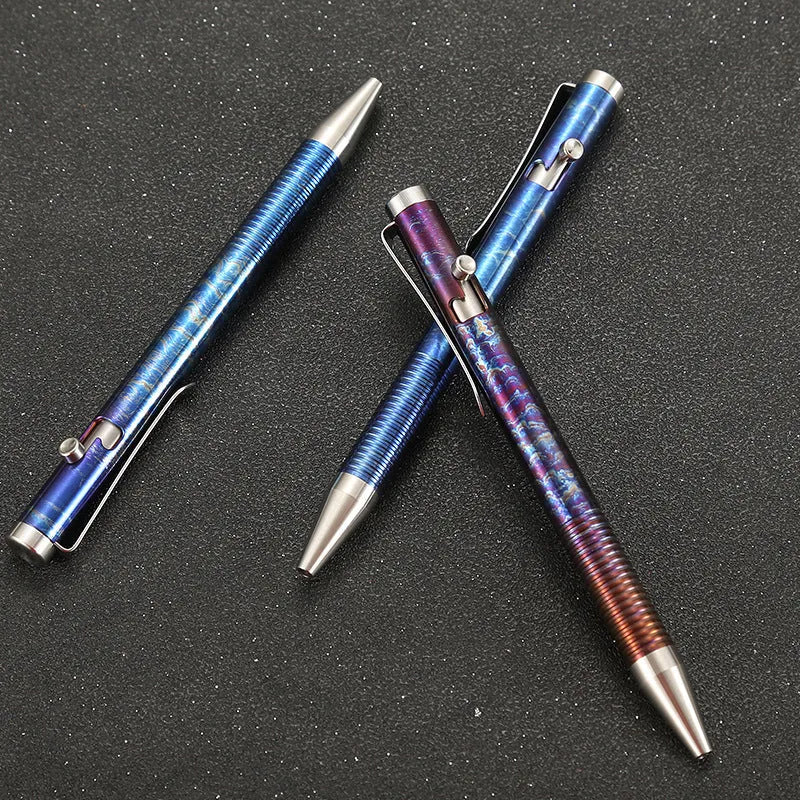 Titanium alloy bolt handle ballpoint pen with magic colour finish showing random phantom colour distribution