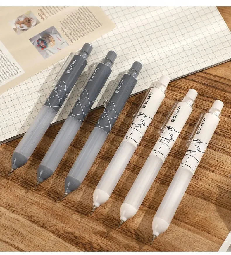 White and black 0.5mm automatic pencils with cloud grip design on plastic body