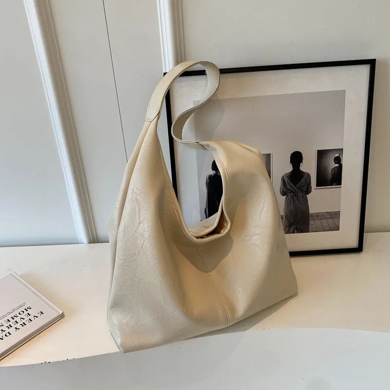 Soft leather shoulder bag in street trend style with large capacity design
