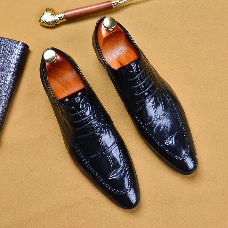 Men's black alligator pattern leather shoes with a silver horse bit buckle on the front.