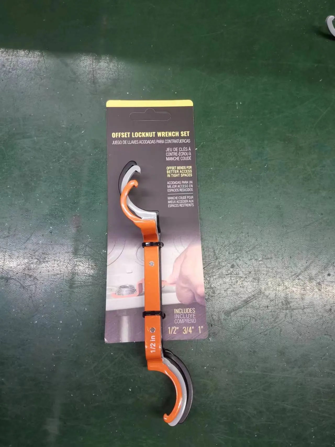 Three wrench set showing orange crescent, grey magnetic suction and black catheter locking designs with H251 model marking