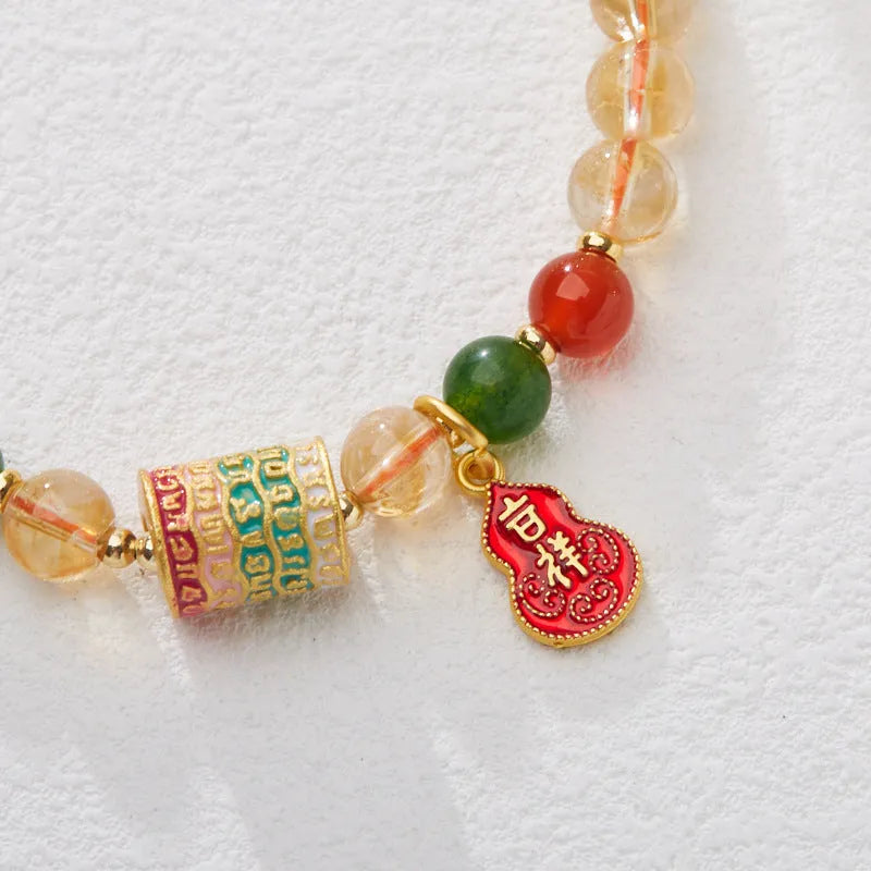 Hand-woven citrine crystal bracelet with five-sutra geometric design in fresh styling