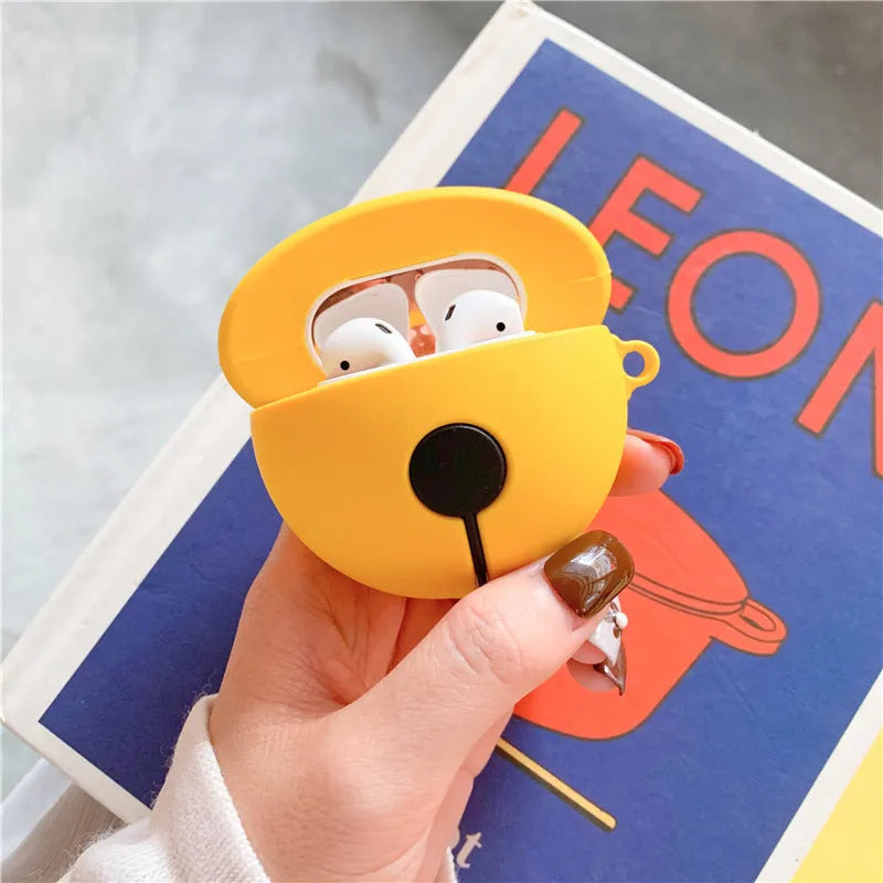 Yellow silicone bell-shaped case for AirPods with metal keychain ring attached