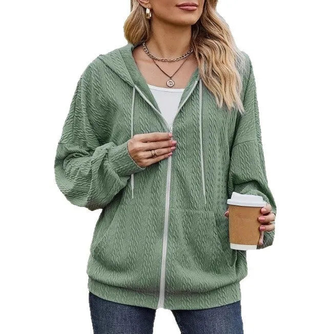 Green women's hooded sweater coat with zip front, loose fit, and long sleeves.