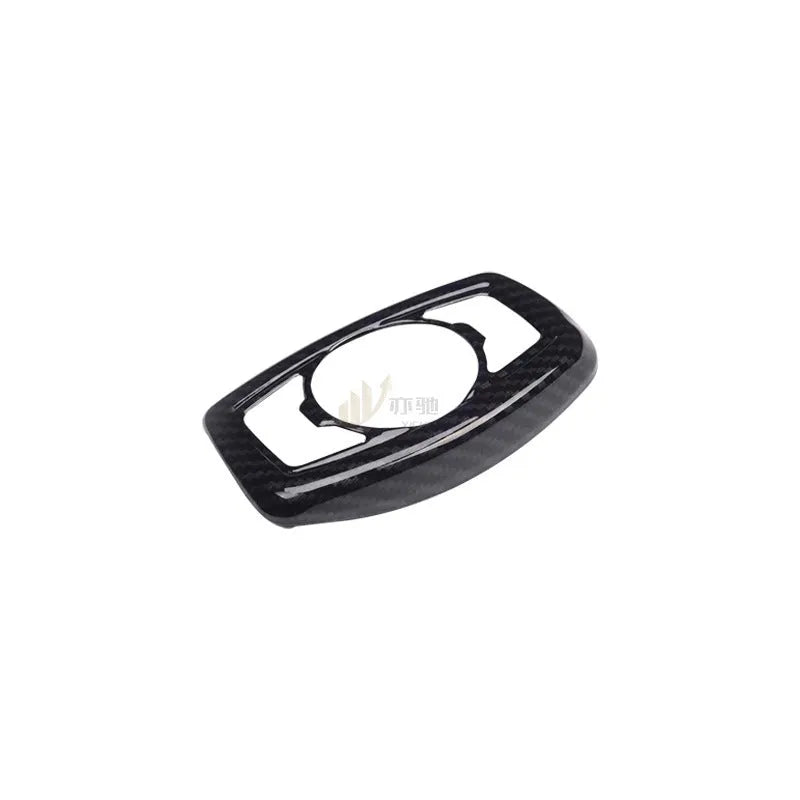 Carbon fibre decorative patch for Ford F150 Raptor headlight control housing on dashboard