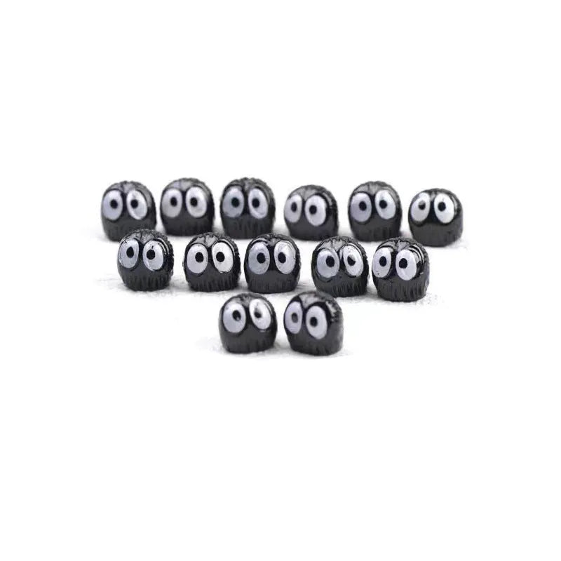 Black cartoon briquette car decoration made from resin with traceless tape