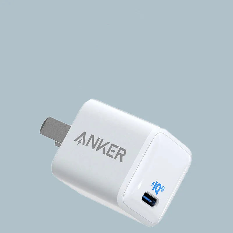 White 18W USB travel charger for mobile phone fast charging