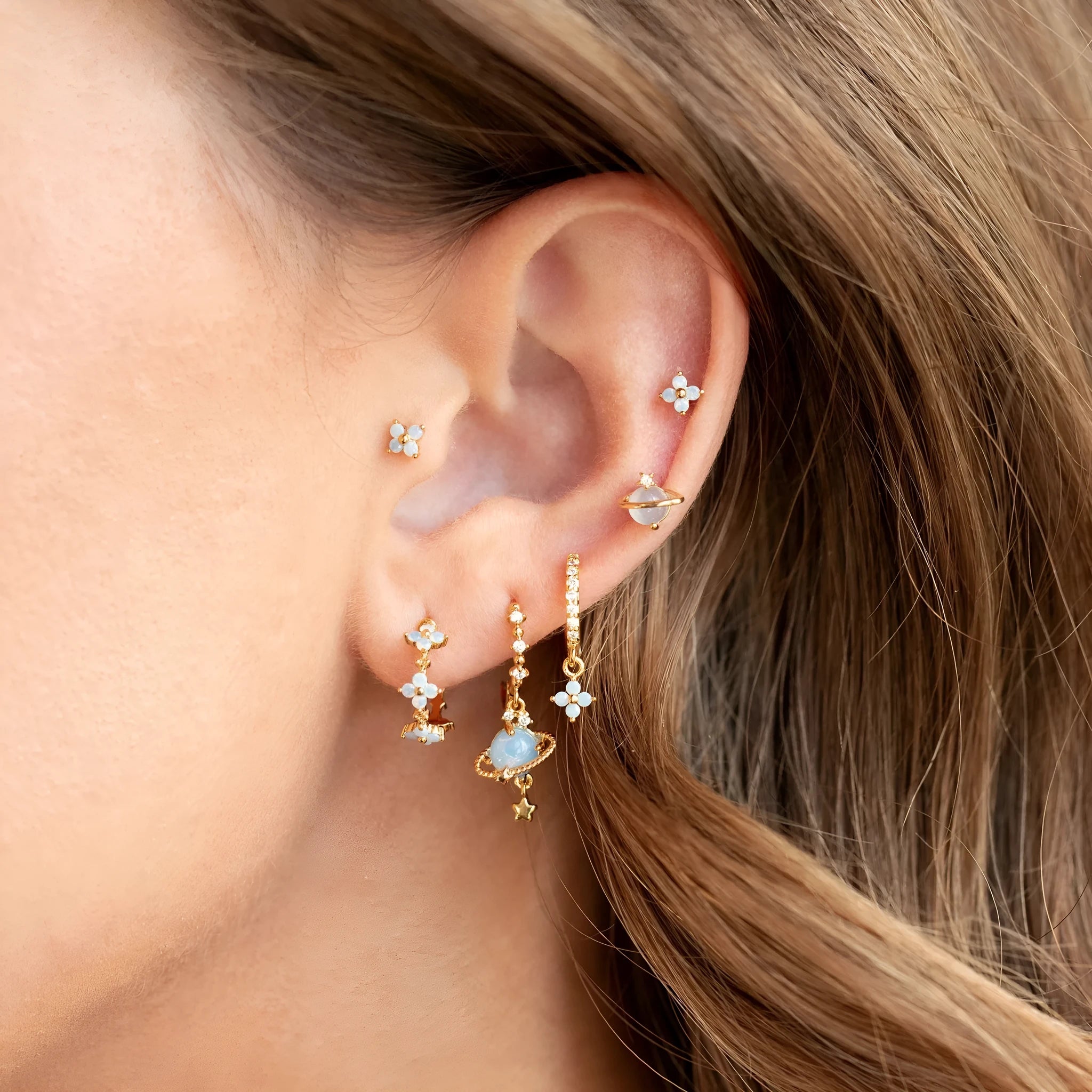 Flower-shaped ear studs with protein nail and zircon mosaic details in gold or silver Japanese Korean style