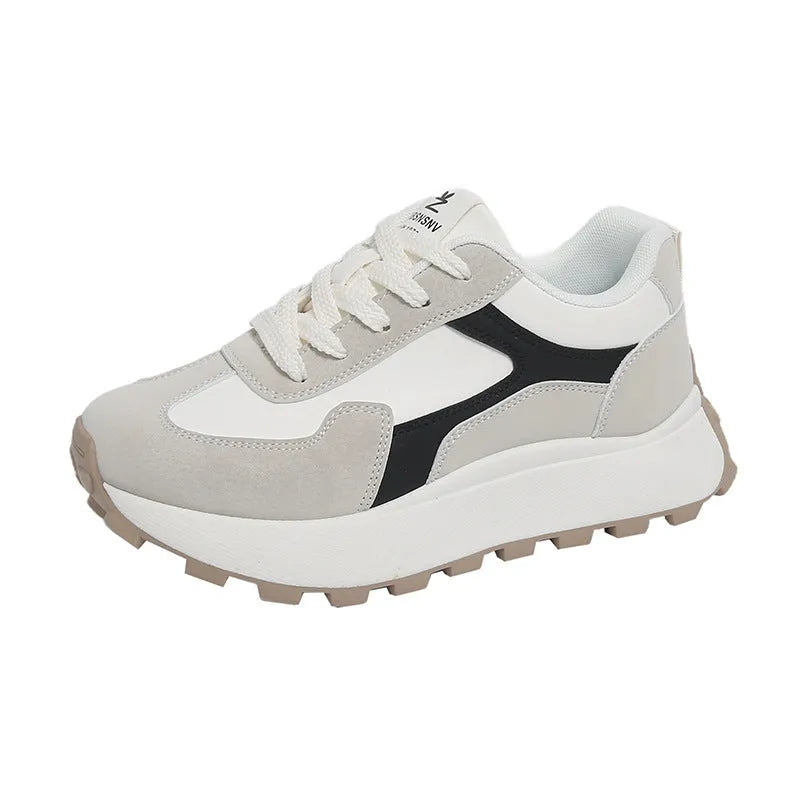 Women's solid colour platform sports running shoes with mesh upper and rubber sole in three colour options.