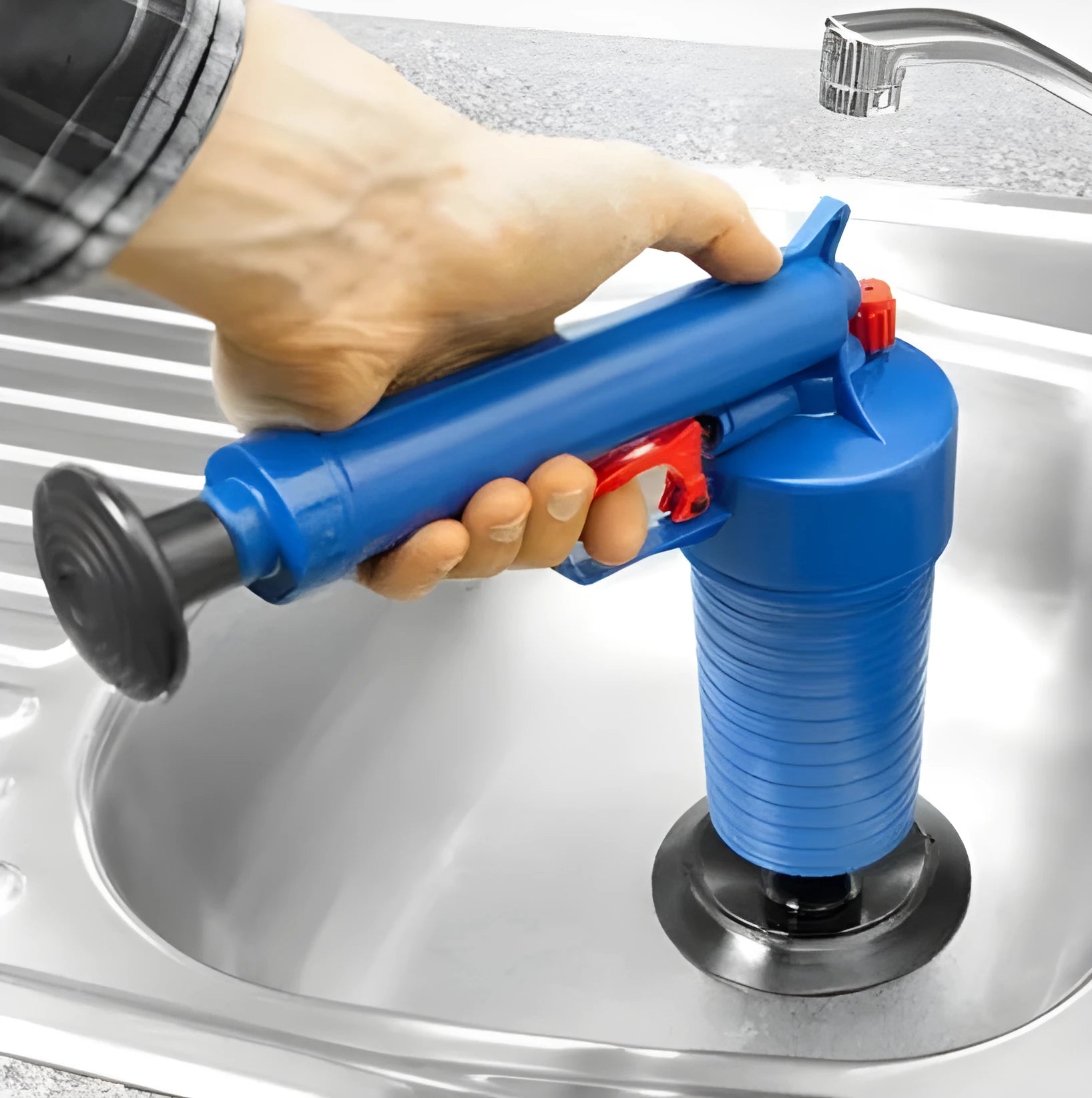 Black and yellow plastic manual drain blaster gun with handle and four different sized suction cup adaptors.