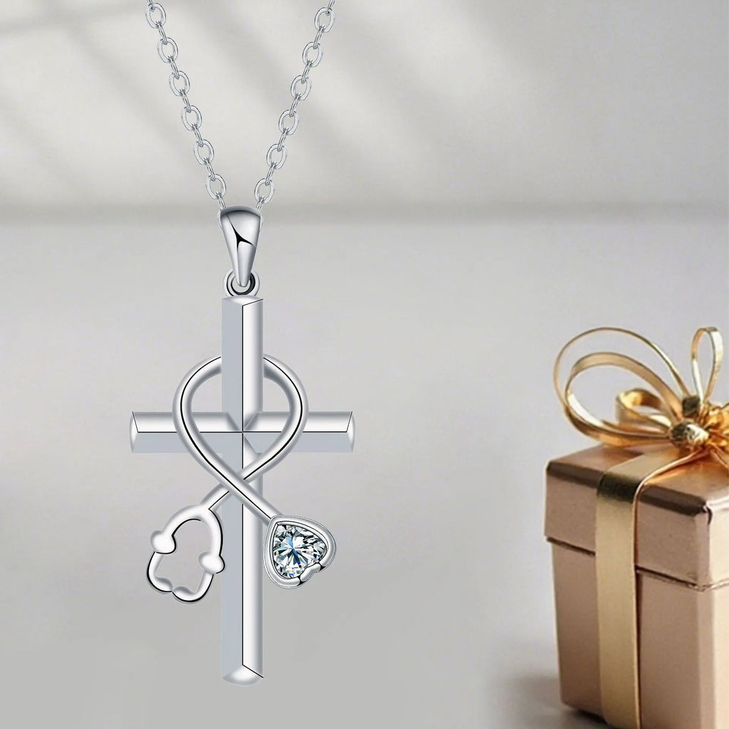 Close-up of a copper stethoscope pendant necklace on a cross-link chain for women.