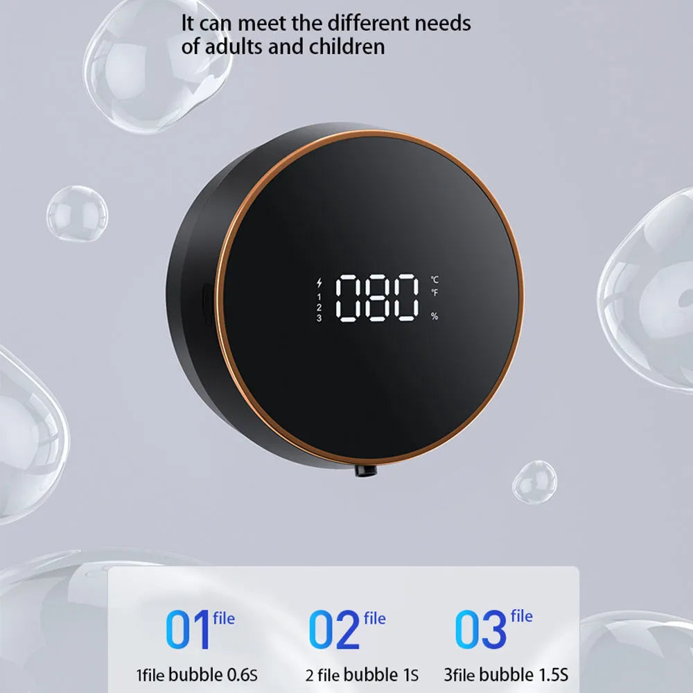 Black automatic sensor foam soap dispenser mounted on a bathroom wall with USB charging cable.