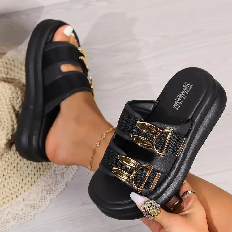 Women's apricot suede slippers with thick rubber soles shown from the side