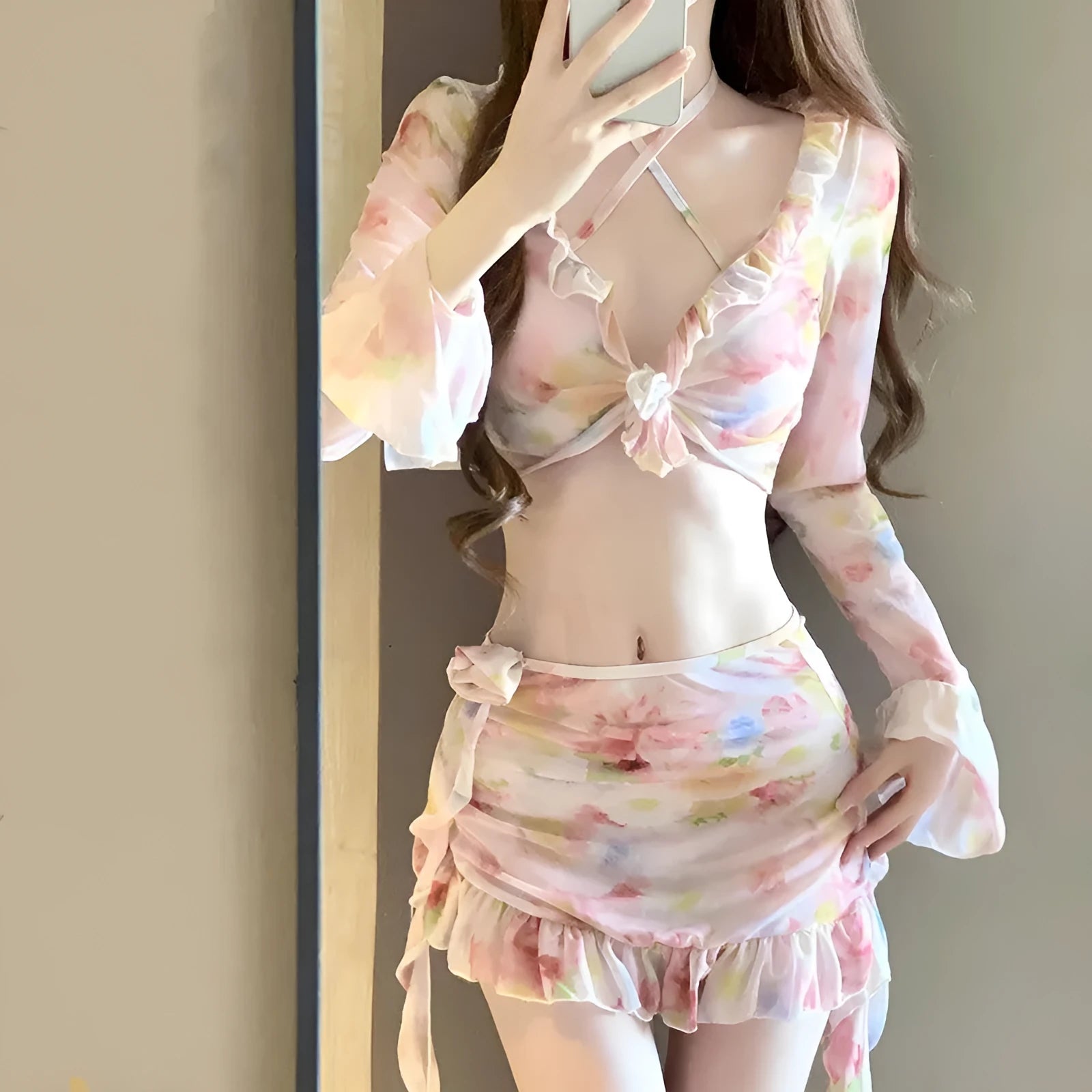 Women's cherry blossom pink floral bikini swimsuit on mannequin