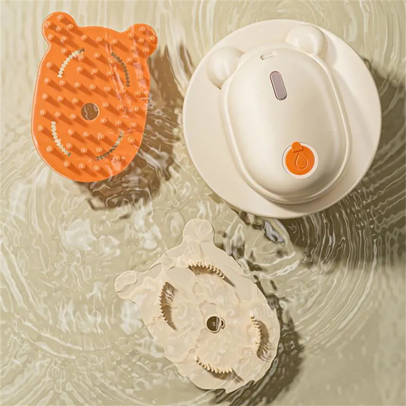 Rechargeable pet spray massage comb with removable silicone heads in pink colour