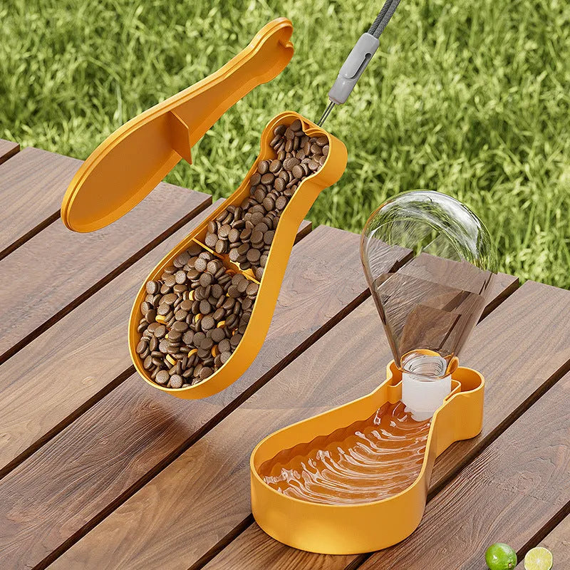 Orange and white portable pet water feeder with water bottle and food container for dogs and cats