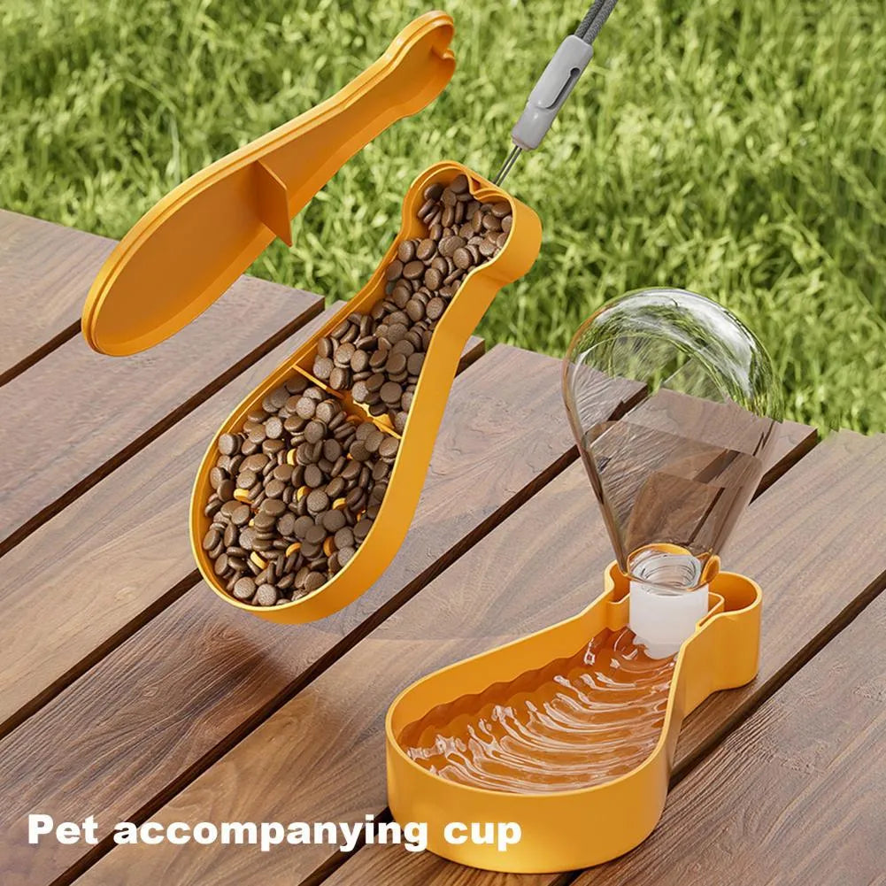 Orange and white portable pet water feeder with water bottle and food container for dogs and cats