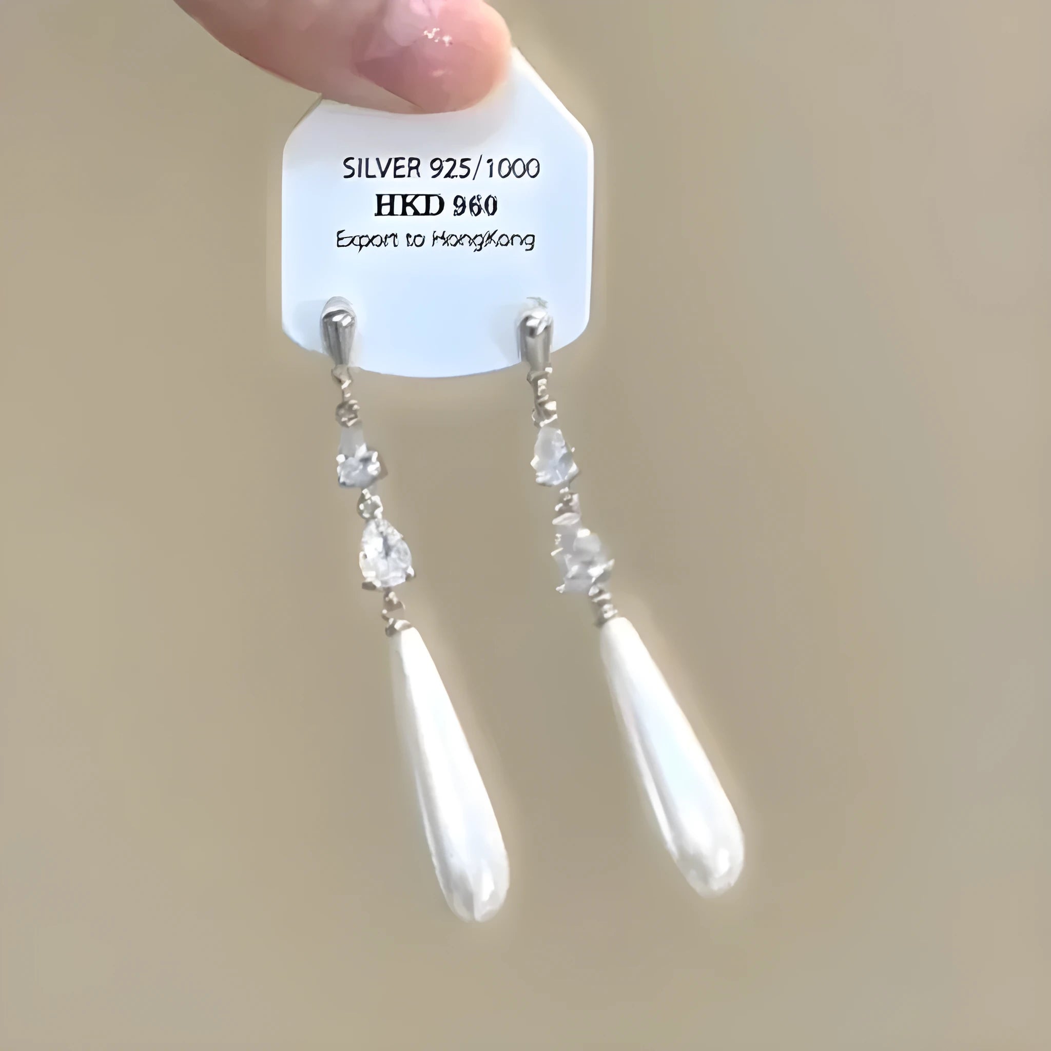 Geometric heart-shaped women's earrings with rhinestones and dangling tassels in silver-toned electroplated alloy
