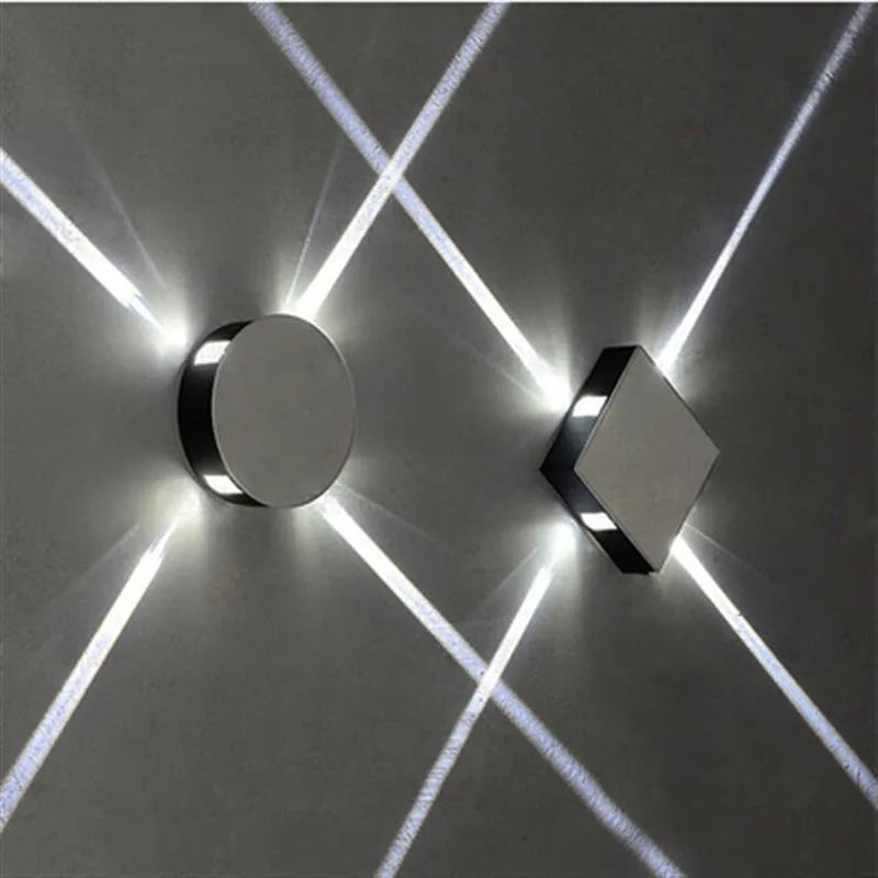 Modern square and round aluminium LED wall light with iron shade in warm white or white.