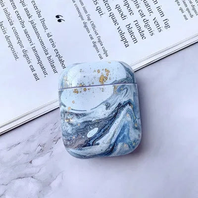 White marble hard PC protective case covering Apple AirPods wireless earphone charging box