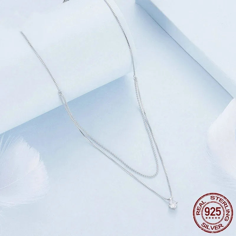 Double-layer sterling silver necklace with S925 pendant on pearl chain in silver colour