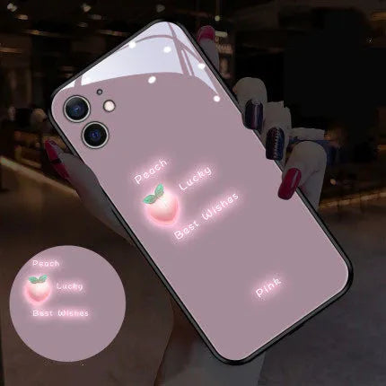 Luminous iPhone case with voice-activated colour light showing white daisy pattern on TPU protective shell