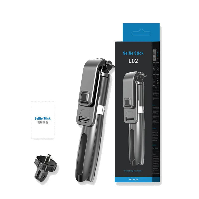 Black Bluetooth selfie stick extended to full length with smartphone attached and remote control in hand