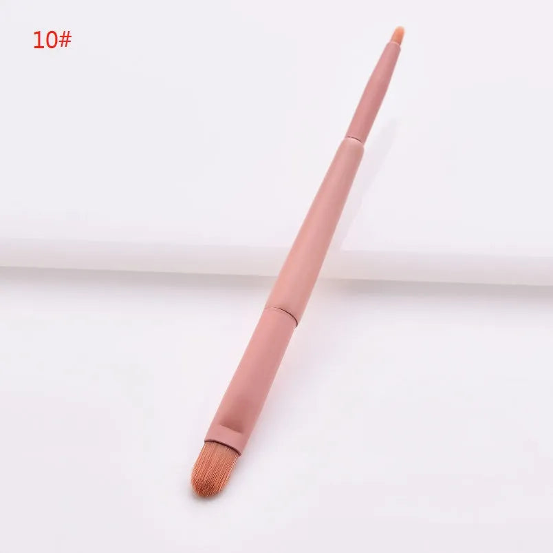 10 professional makeup brushes with wooden handles, including powder, foundation, and double-ended detail brushes.