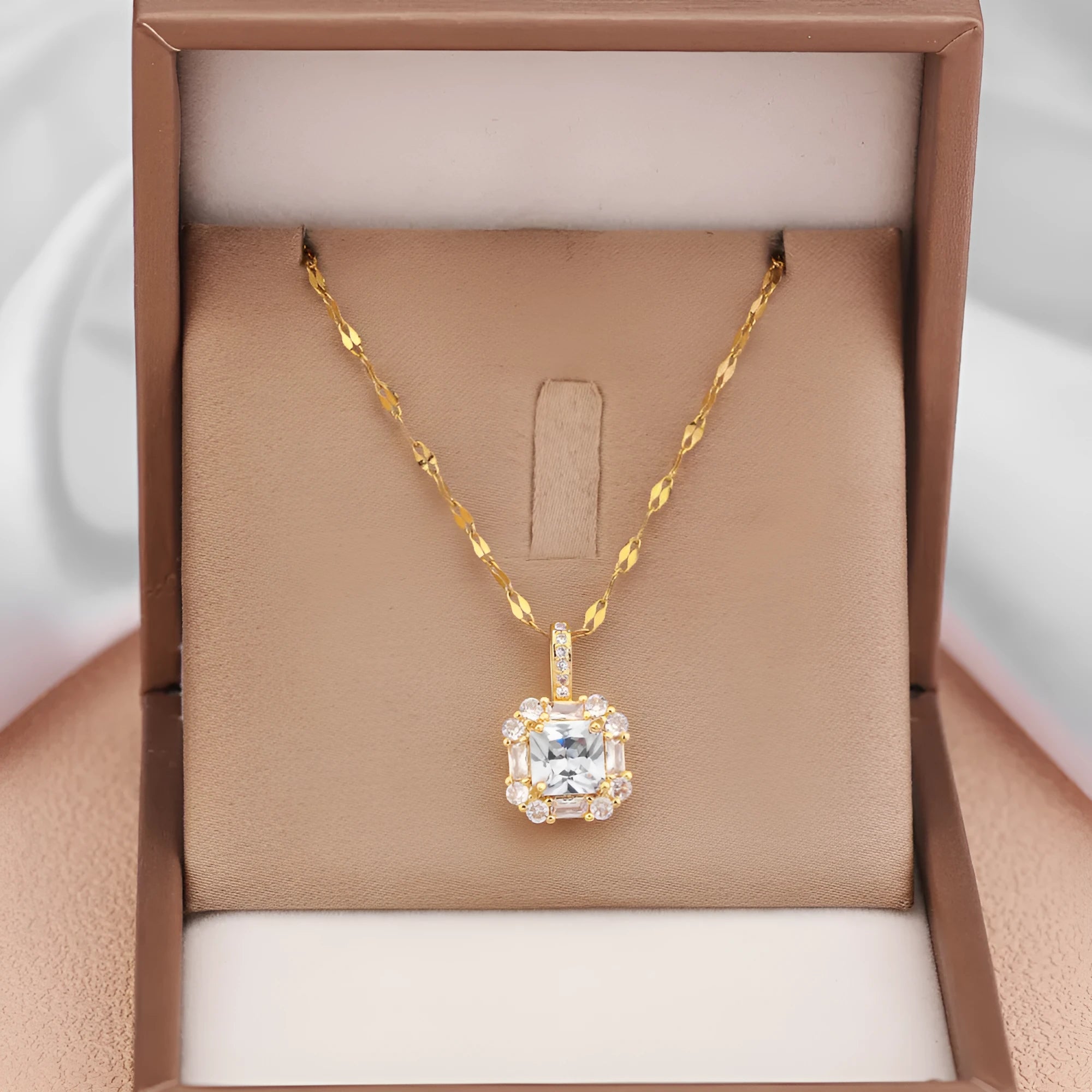 Gold titanium steel clavicle necklace with quadrilateral zircon pendant on water wave chain