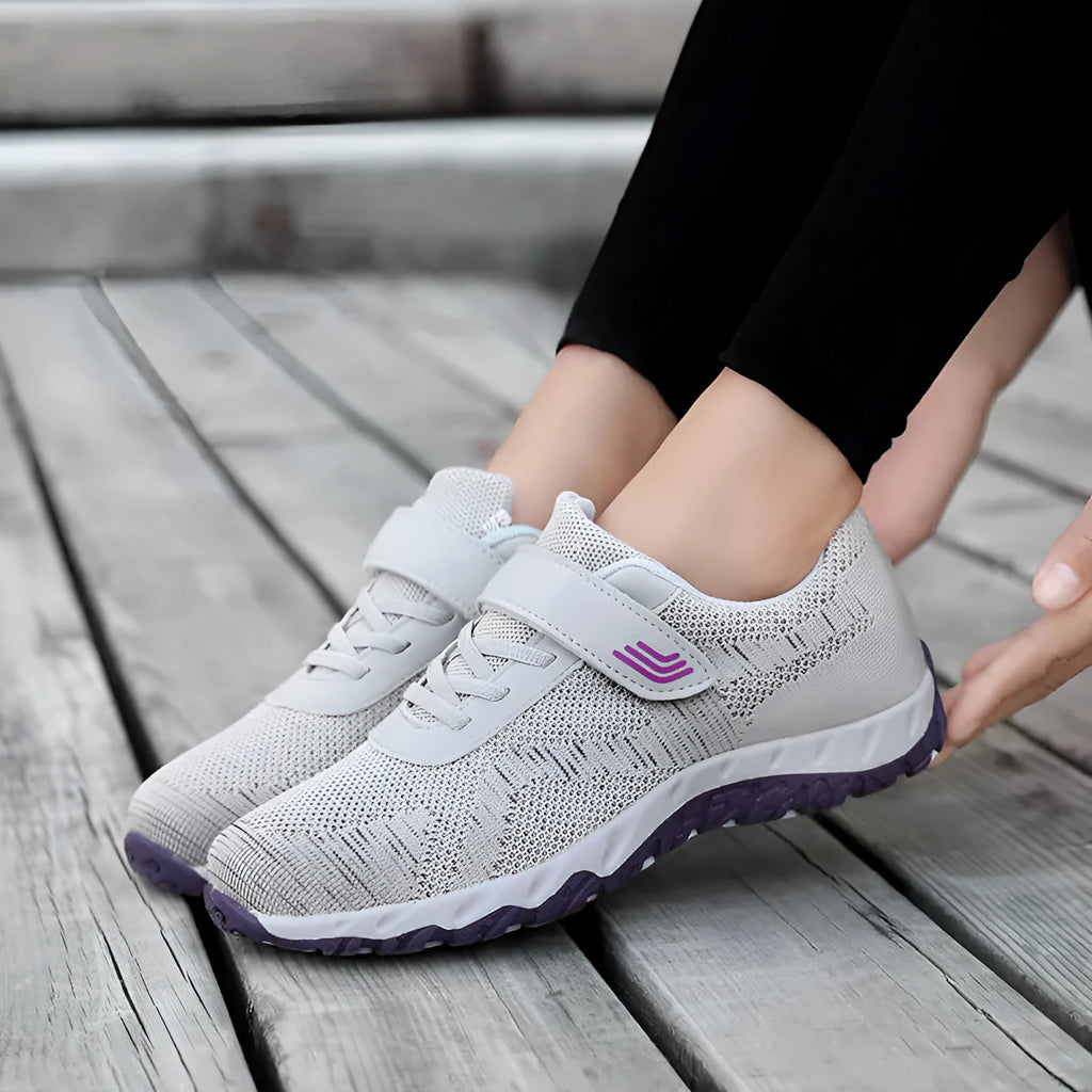 Women's low-top wedge heel shoe in mesh with Velcro strap, shown in a solid colour.