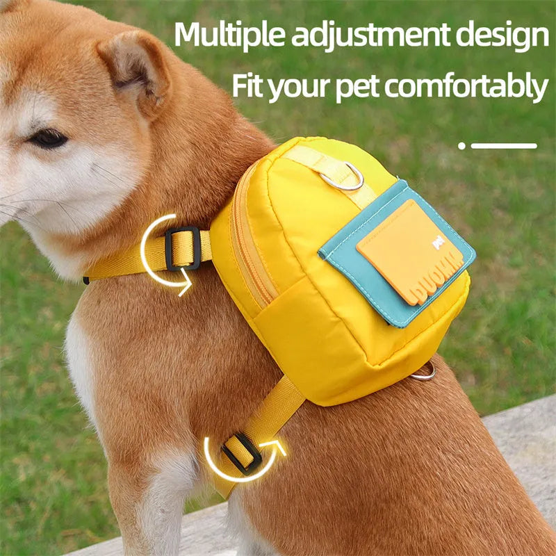 Blue dog backpack with harness and storage compartment for snacks during outdoor activities