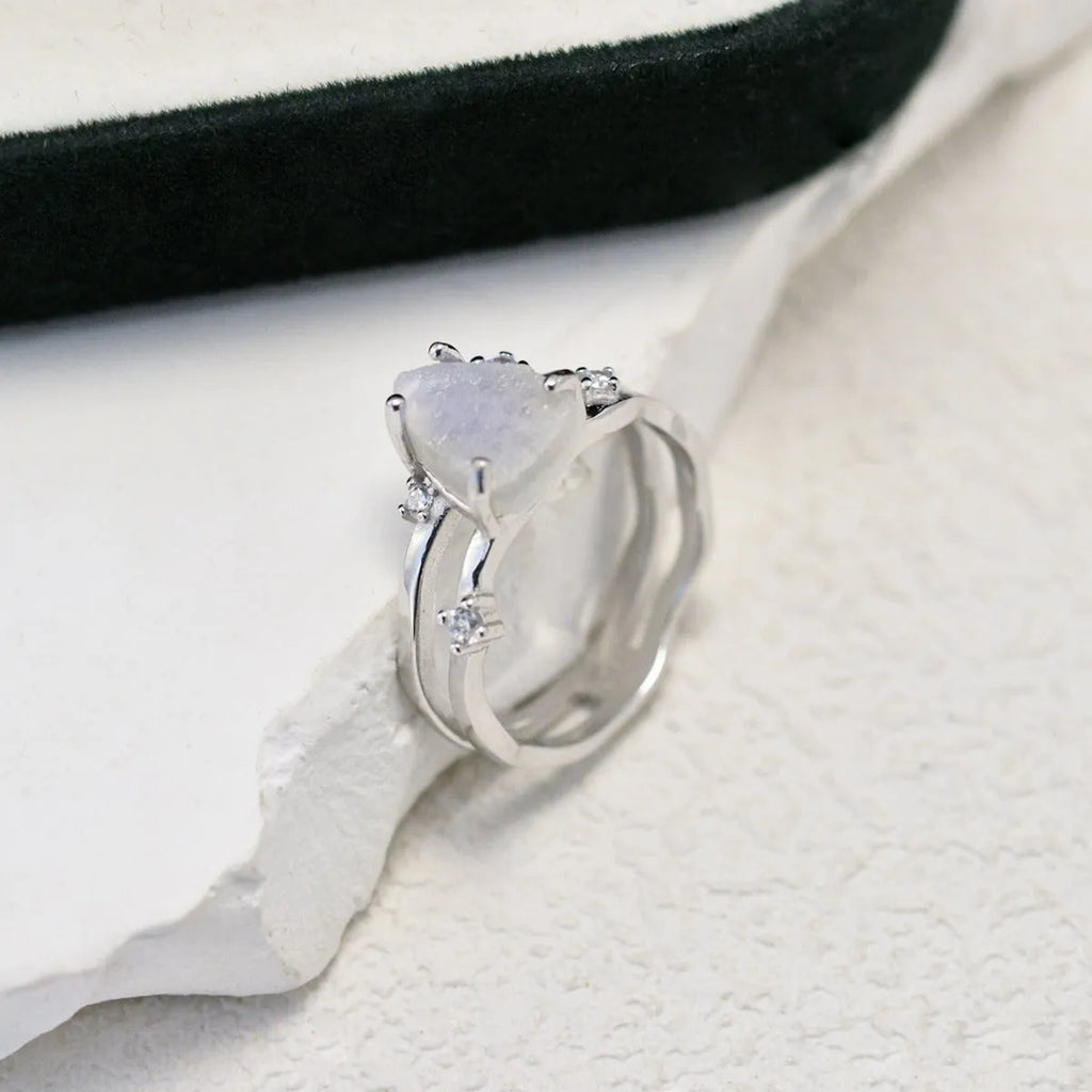 S925 sterling silver moonstone ring with geometric triangle shape on jewellery display