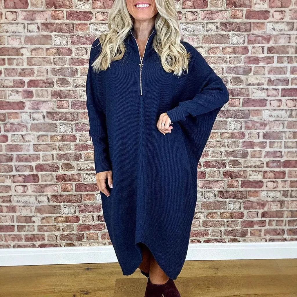 Women's solid colour loose knitted dress with raglan sleeves on a hanger