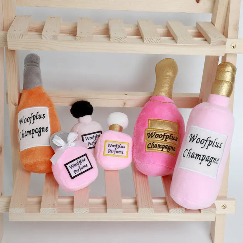 Plush wine bottle shaped pet toy for dogs and cats in assorted colours.