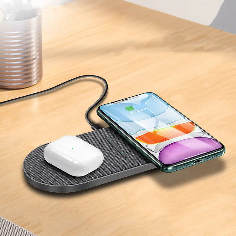 Black wireless charger pair with two charging pads for simultaneous phone and earbuds charging