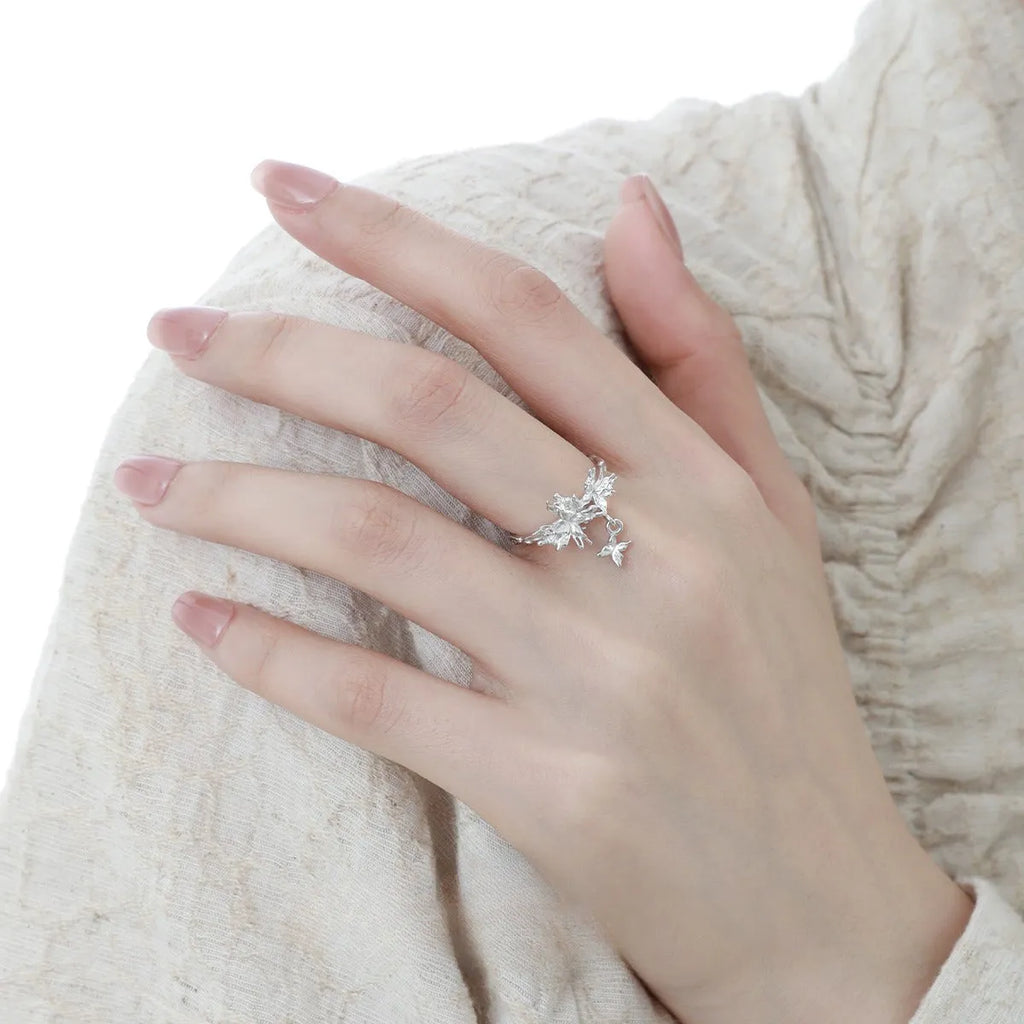 Silver adjustable butterfly ring with electroplated finish in white gold or 18K gold colour.