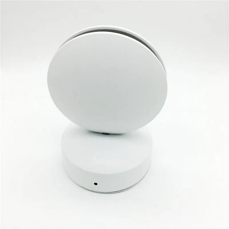 Modern aluminium and glass LED spotlight bar wall lamp mounted on a wall.