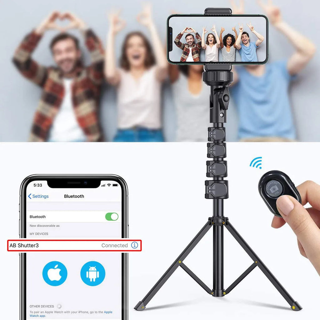 Black aluminium selfie stick tripod extended next to a smartphone, showing its 5-section telescopic shaft.