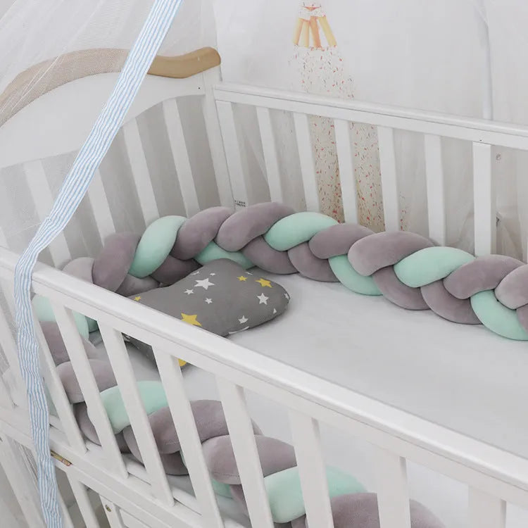 Braided knot cot bumper cushion in spandex velvet for crib safety protection.