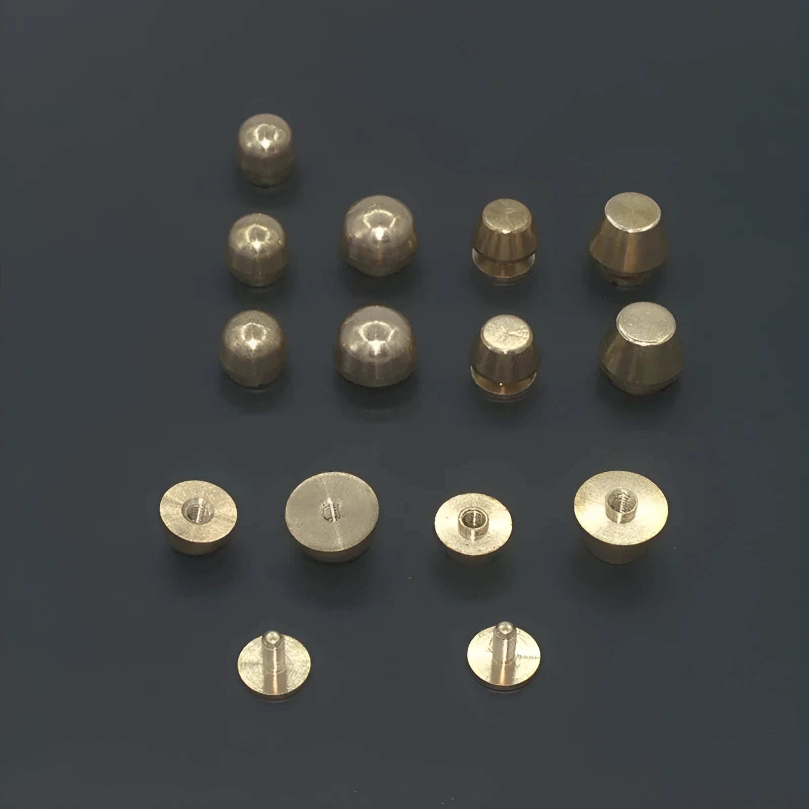 Brass decorative buckles for foot nails in 10mm and 12mm sizes with round and geometric shapes