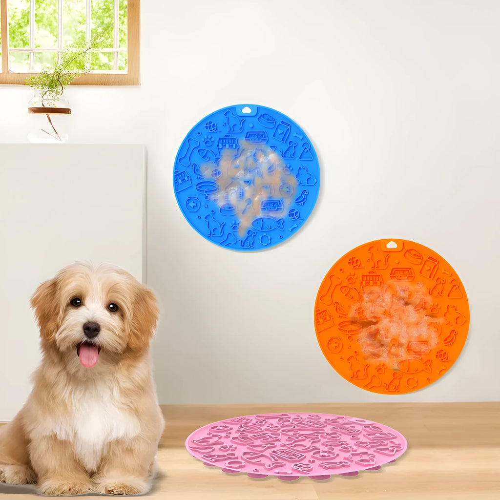 Round silicone pet licking mat with suction cup base in blue colour on a kitchen floor