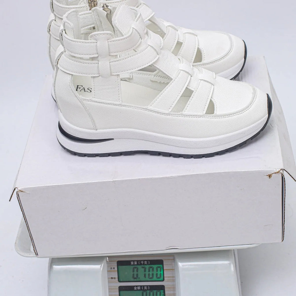 Women's black close-toed platform sandals with hollow-out design and Velcro fastening