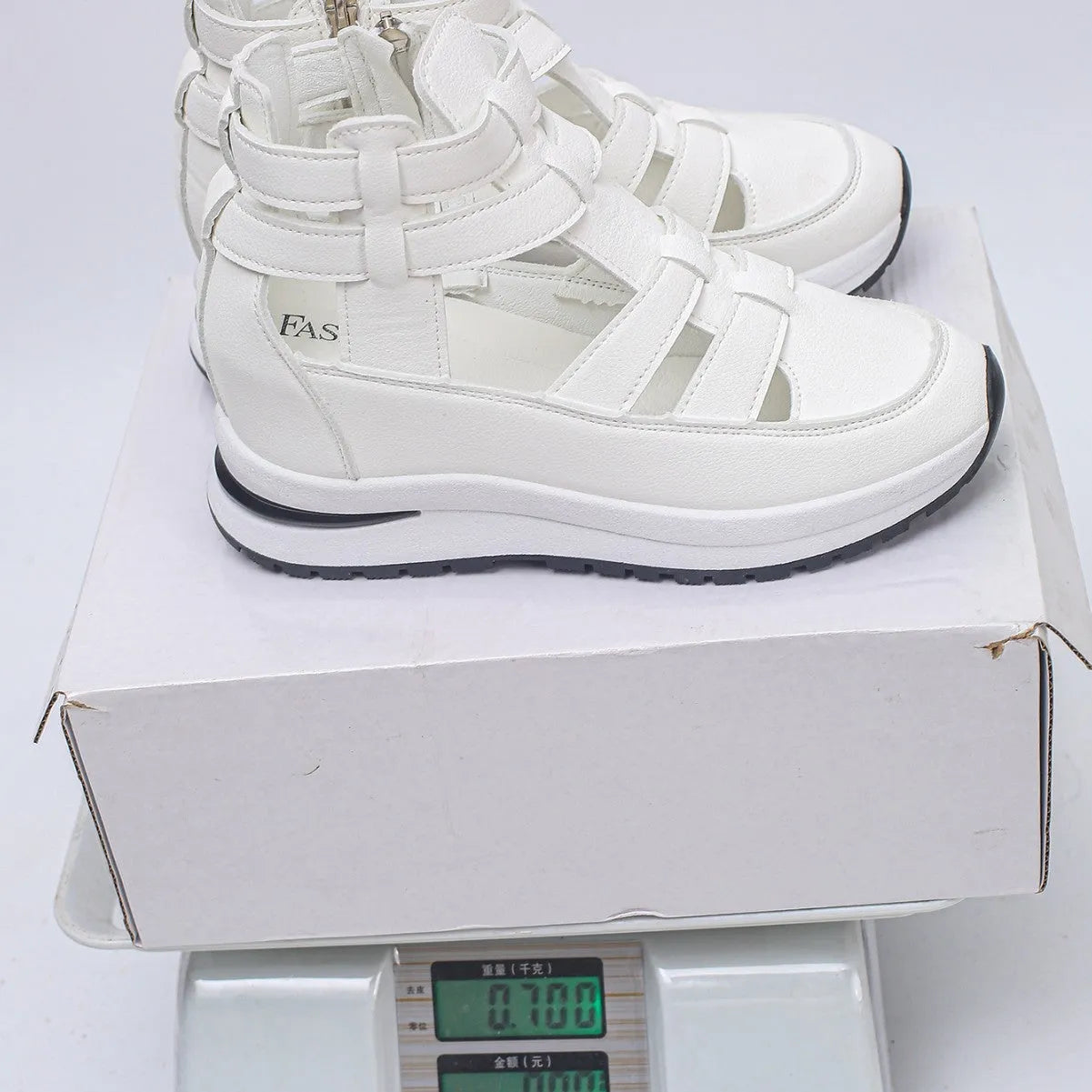 Women's black close-toed platform sandals with hollow-out design and Velcro fastening