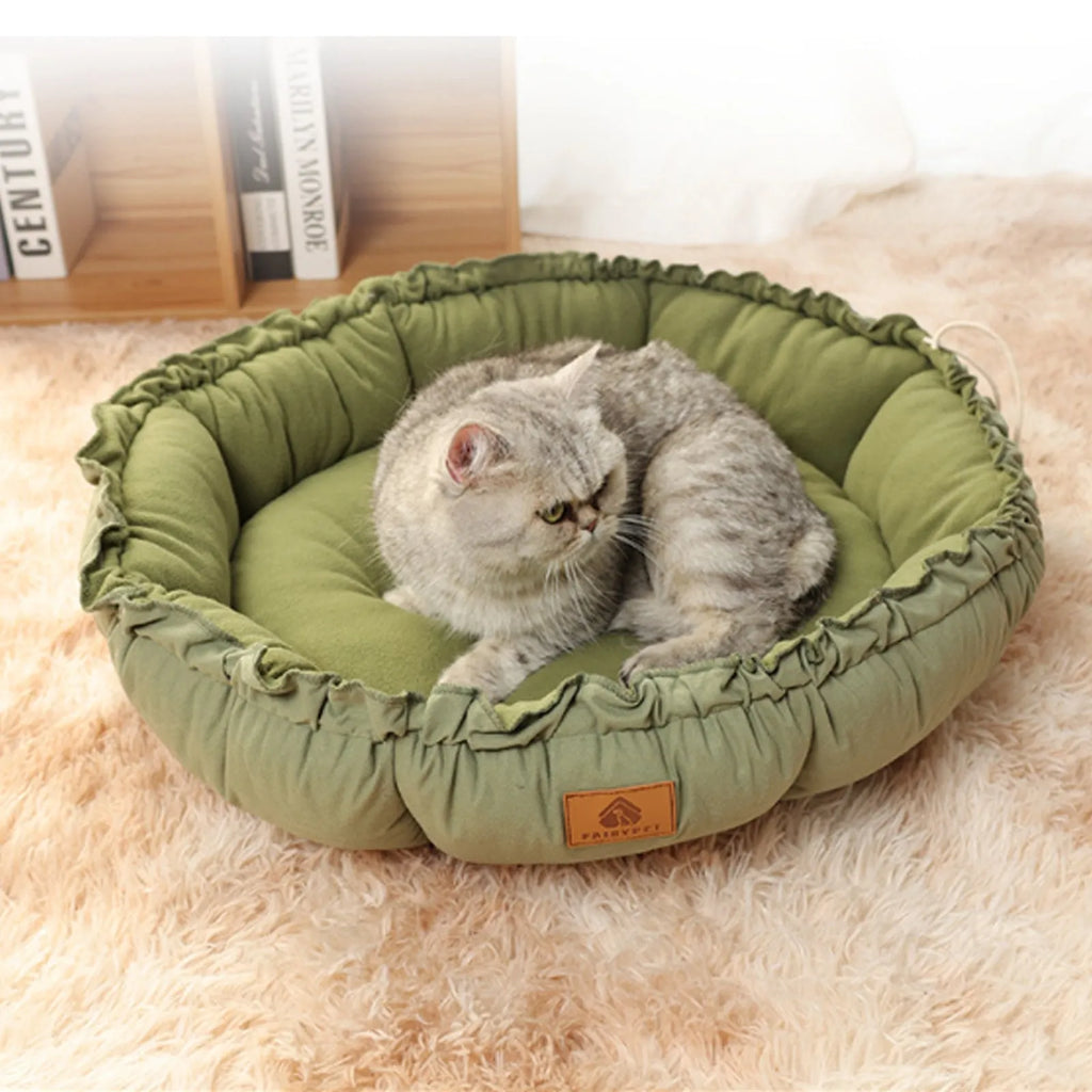 Grey reversible donut pet bed with raised bolsters for cats and small dogs