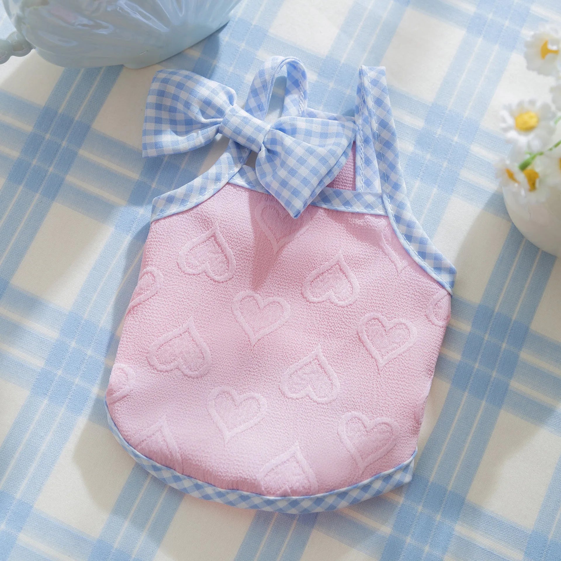 Small dog vest with heart relief texture bow suspenders in elastic polyester fabric