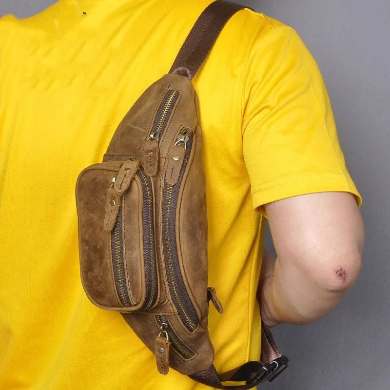 Dark crazy horse cowhide leather messenger bag with single shoulder strap showing 32cm width.