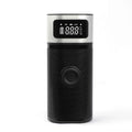 Black portable wireless vehicle air pump with USB-C cable and multiple inflation nozzles in storage bag